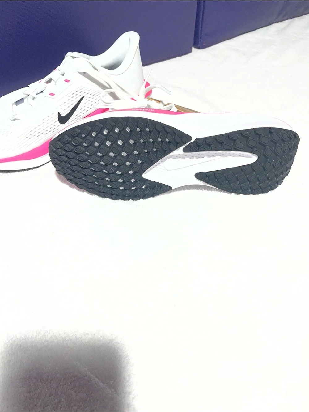 Nike Women’s White Sneakers with Pink Trim and Black Swoosh